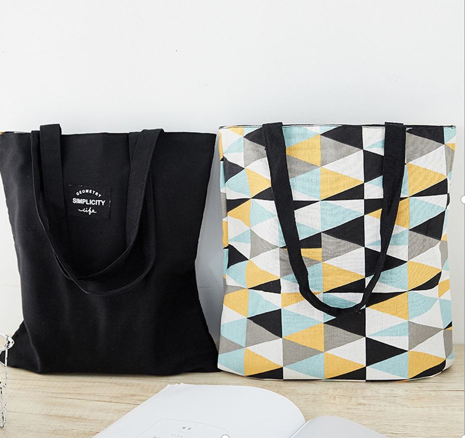 Single-shoulder bag black and yellow geometric shapes