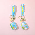 Dake duck oil floating camera keychain