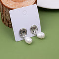 Portrait Embossed Pearl Pendant Earrings