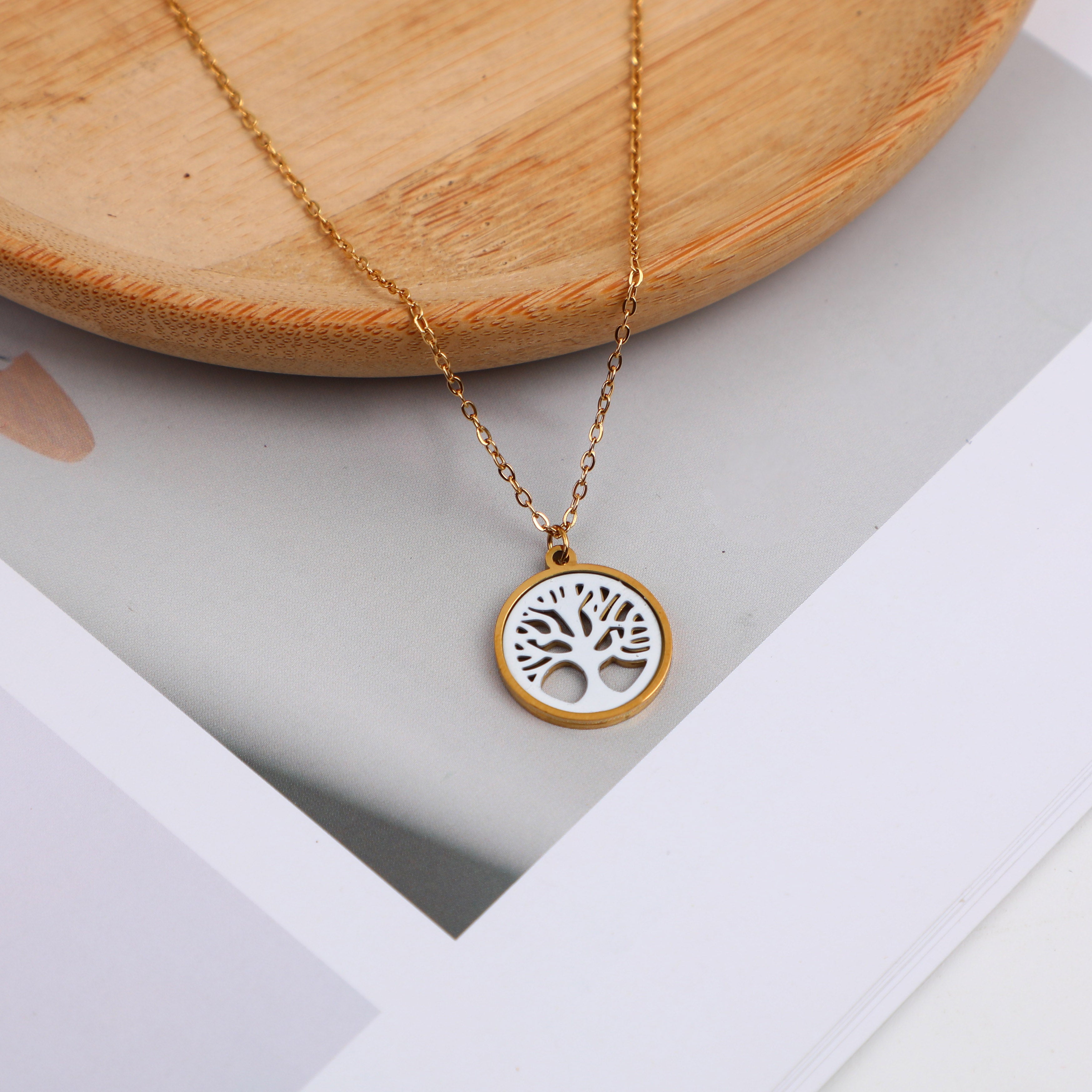 Pierced tree pendant necklace