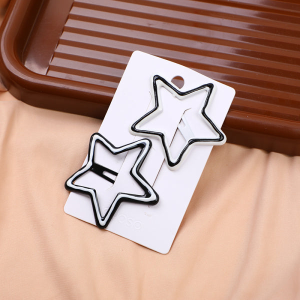 2 hair clips with a line pattern and a five-pointed star