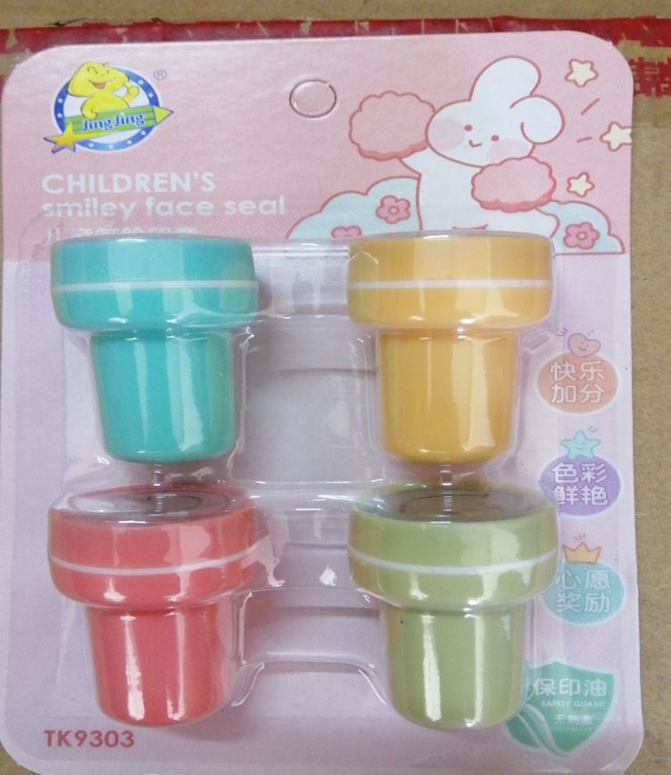 Smiley face seal stamps