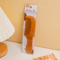 Spray-painted wood comb with round handle