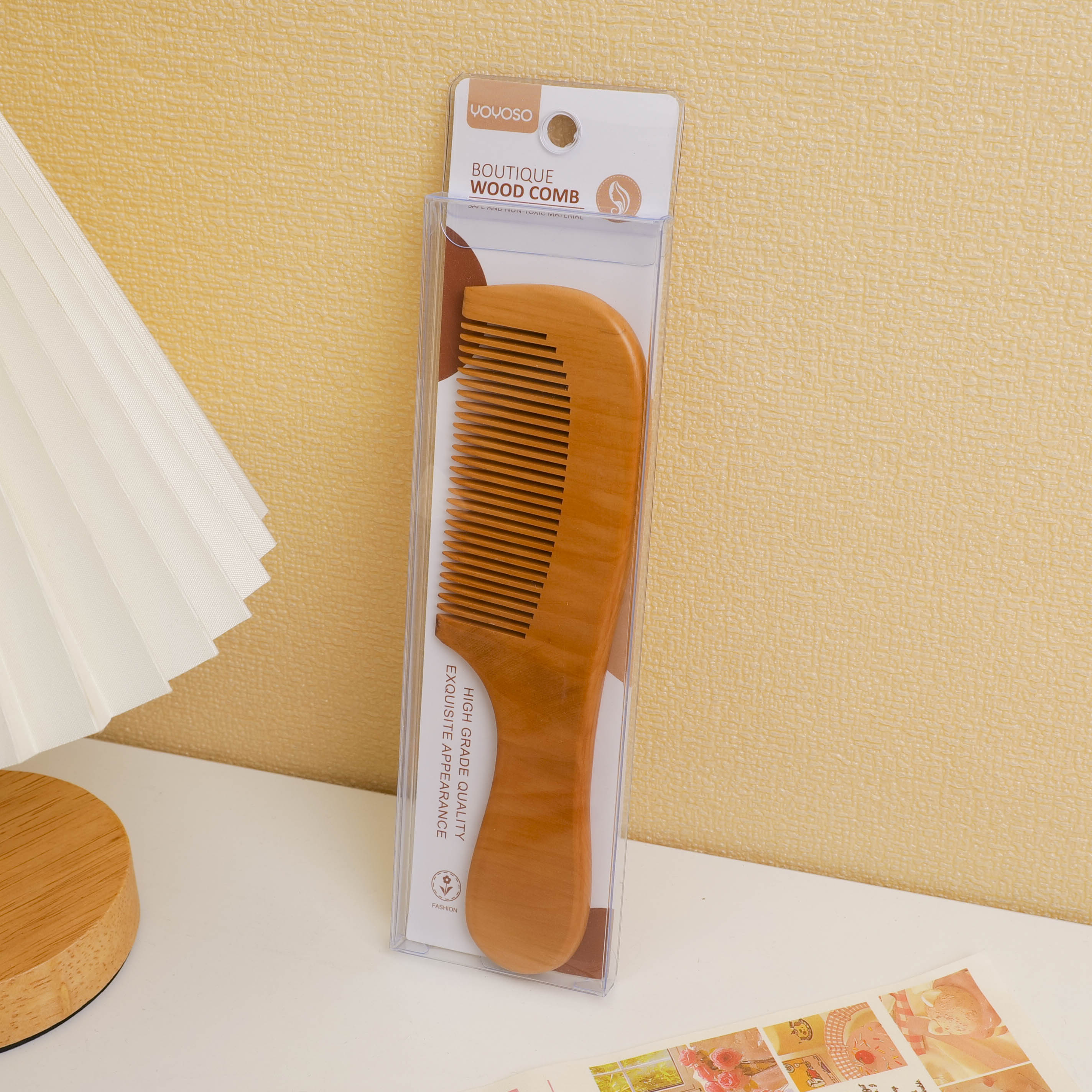 Spray-painted wood comb with round handle