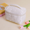 Butterfly cosmetic bag with lift-off lid design - white