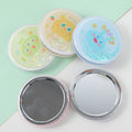 Round happy monster mirror with quicksand