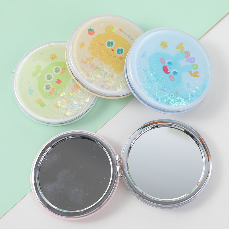 Round happy monster mirror with quicksand
