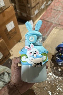 blue bottle with sticker